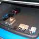 Delphi: The design in the car shown above is a prototype that Delphi is bringing to CES this year. The battery, DC-to-DC converter, fuses and battery controller don’t take up a lot of room, and in a production model they’d be tucked away, likely against the back of the rear bench, over to the side or even under a loading tray.